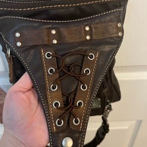 Purse straps around thigh “Double Trouble “